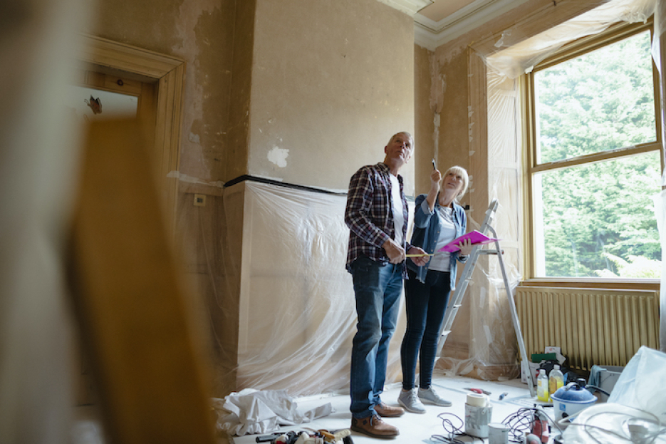 Older Couple Looking At Their Renovations