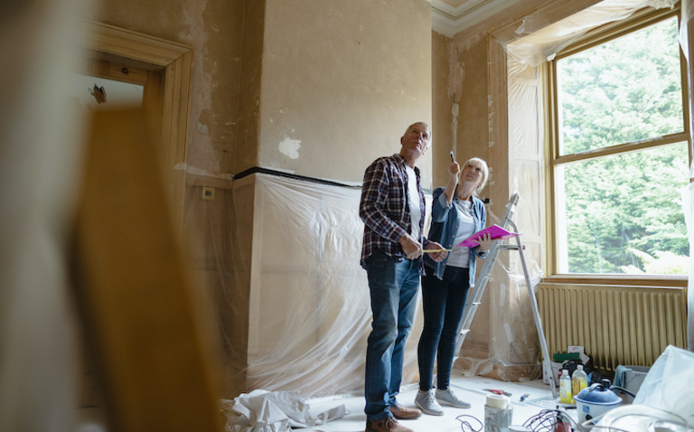 Older Couple Looking At Their Renovations